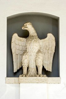Stone imperial eagle next to the portal of the Heilig-Geist-Spital hospital