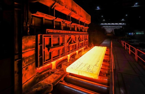 Annealing steel slabs in the hot rolling mill