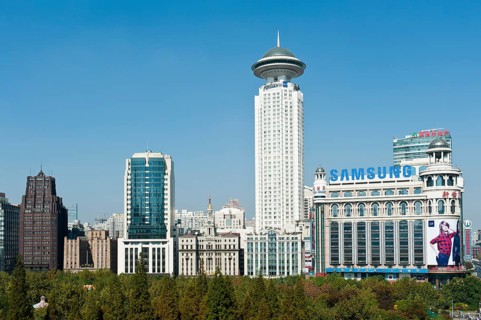Skyscrapers at the park with Radisson Blu Hotel Shanghai New World