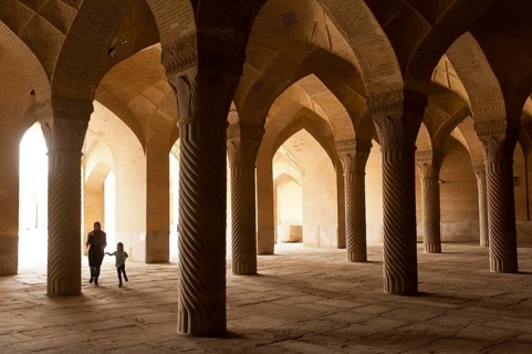 Mother with child in Vakil Mosque prayer hall