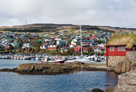 Colorful houses and small boats in the harbor