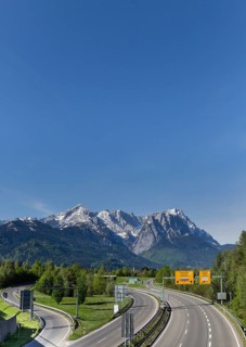 Federal road B2 at the tunnel exit of Farchant and the town entrance of Garmisch-Partenkirchen