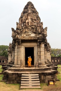 Monk at the entrance to the main portal