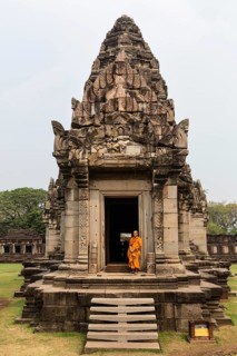 Monk at the entrance to the main portal