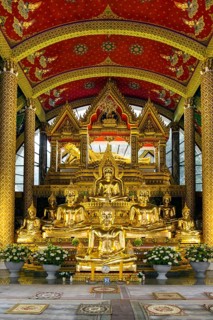 Golden Buddha statues in the temple district Wat Phra That Nong Bua