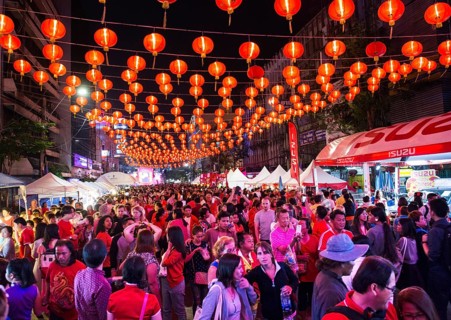 Red chinese lanterns in crowded Yaowarat Road