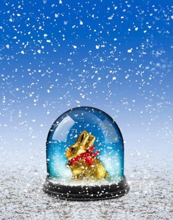 Chocolate Easter bunny in snow globe