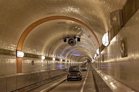 Cars drive through the old Elbe tunnel