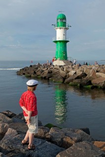 Young boy with a captain's hat