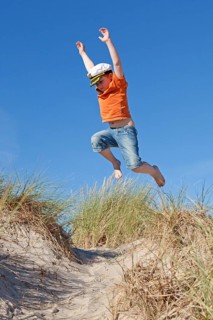 Boy wearing captain's hat