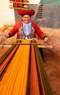 Peruvian working with loom