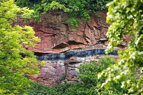 Geological outcrop with overground coal seam