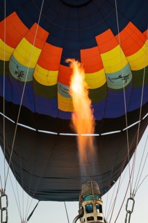 Pilot inflating hot air balloon with two burners