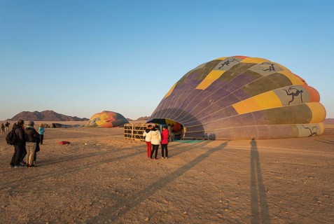 Preparing the hot-air balloons for take-off