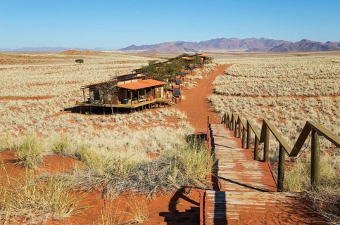The chalets of the exclusive Wolwedans dunes lodge in a beautiful desert setting at the edge of the Namib Desert