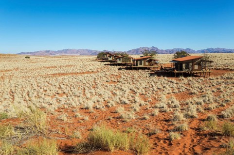 The chalets of the exclusive Wolwedans dunes lodge in a beautiful desert setting at the edge of the Namib Desert
