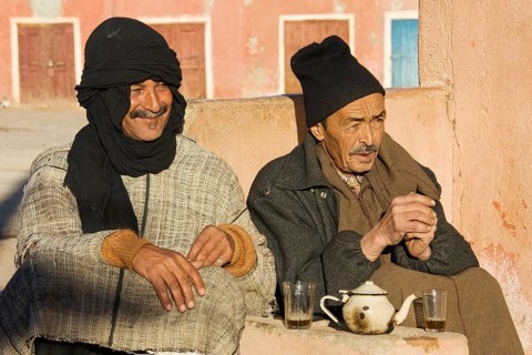 Two Berber men in Tafraoute drinking mint tea