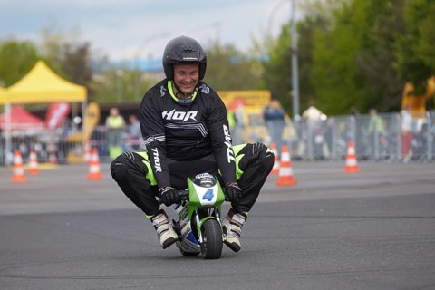 Motorcycle stuntman Mike Auffenberg on a minibike during the ADAC motorbike startup day