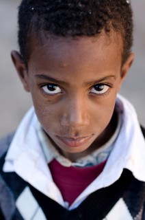 Boy looking up with big eyes