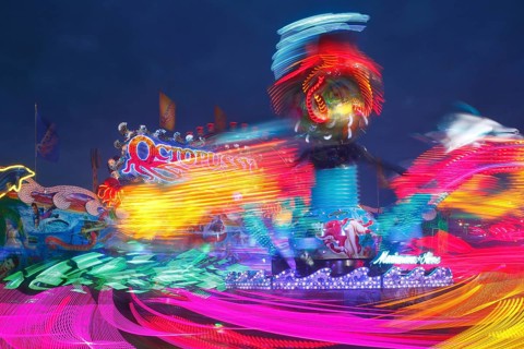 Octopussy ride on the fun fair Bremer Freimarkt at dusk