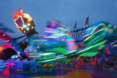 Octopussy ride on the fun fair Bremer Freimarkt at dusk