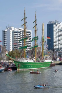 Hospitality ship Alexander von Humboldt II in the Neuer Hafen harbour with Columbus Center at the Sail 2015 festival