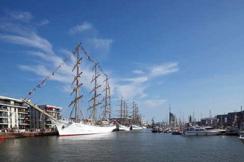New harbor with sailing ships