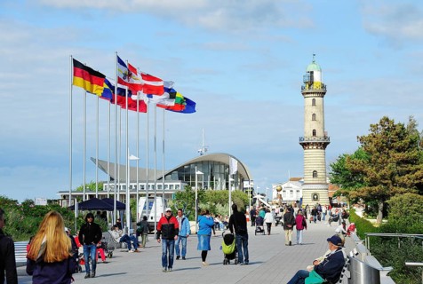 Beach promenade with lighthouse