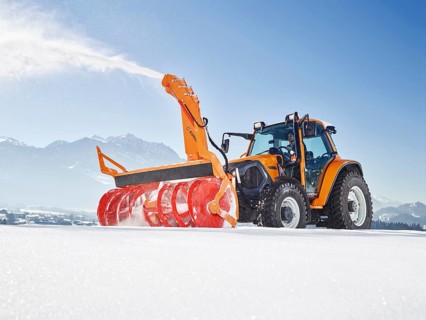 Snowplow with snowblower clearing snow