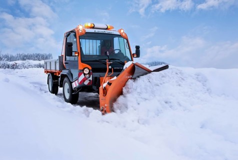 Snowplow removing snow
