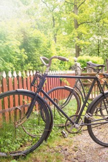 Rural scene with old retro bikes in a bicycle rack