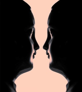 Old porcelain dolls face to face