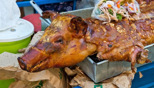 Roasted suckling pig and sandwiches for sale