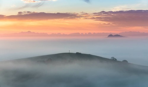 Morning high fog with view towards the mountains Bisberg