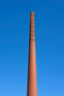 Old brick factory chimney