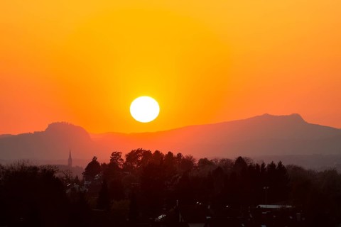 Sunset between the Hohentwiel and Hohenstoffeln mountains in the Hegau