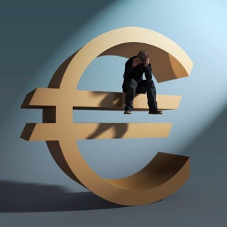 Man sitting on euro symbol