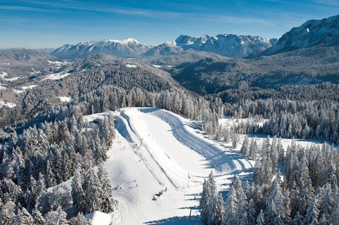 Skiers on Hausberg Mountain