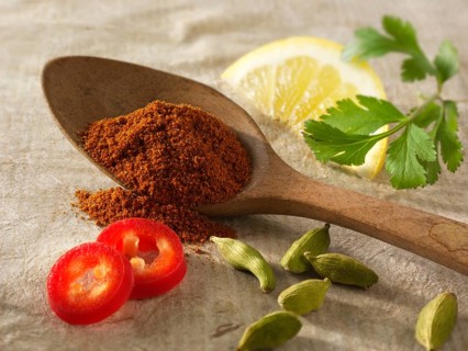 Fresh ground chilis with cardamom seeds