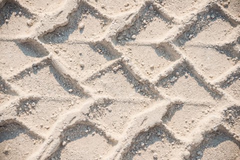 Tire tracks in the sand