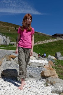 Girl on the barefoot path on the Watles Adventure Mountain