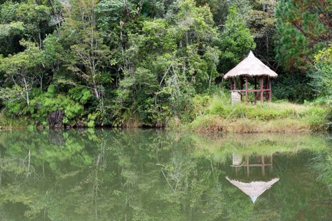 Cottage reflected in a lake