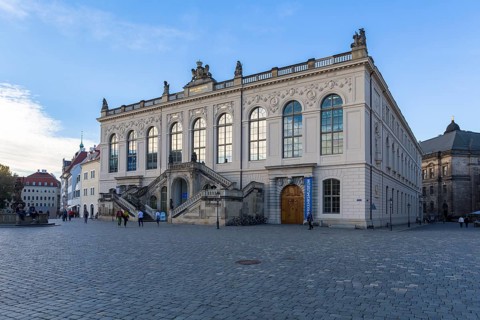 The Transport Museum on Neumarkt square at dusk