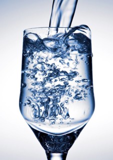 Water is being poured into a glass