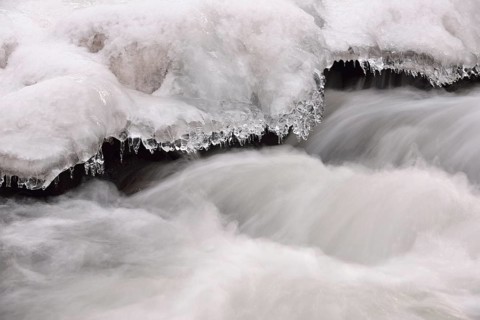 Waterfall covered in snow and ice in the Selke Valley
