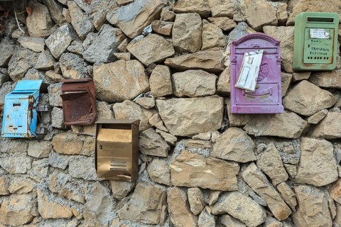 Post boxes on a stone wall