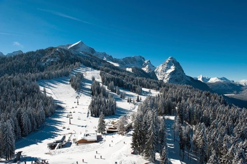 Skiers on Hausberg Mountain