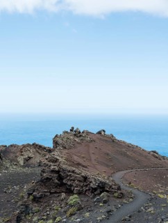Hiking trail through a lava landscape
