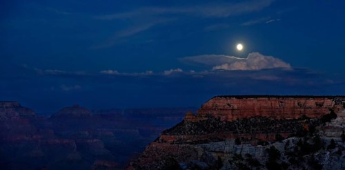 View of the Grand Canyon at night with full moon