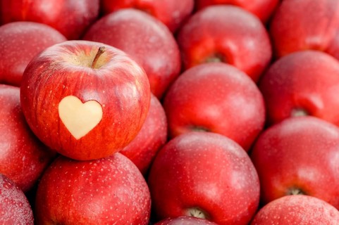 Apple with a heart shape cut-out